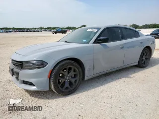 2020 Dodge Charger SXT with VIN 2C3CDXBG8LH248330, listed as a Copart auction lot 57206585 with 94,646 mi miles and Clean title. Bid and sale history available at DreamBid. Image 1.
