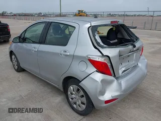 2013 Toyota Yaris L with VIN JTDKTUD32DD542761, listed as a IAAI auction lot 41969533 with 123,281 mi miles. Bid and sale history available at carsss.com. Image 3.