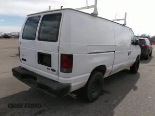 2010 Ford Econoline Cargo Commercial with VIN 1FTNE2EW0ADA98103, listed as a IAAI auction lot 41735290 with 143,717 mi miles and . Bid and sale history available at DreamBid. Image 4.