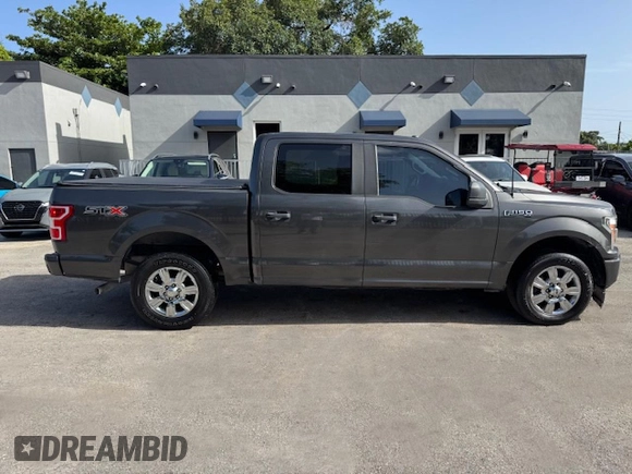 2019 Ford F-150 XL with VIN 1FTEW1CP1KKF22890, listed as a Copart auction lot 61813095 with 63,774 mi miles and Salvage title. Bid and sale history available at DreamBid. Image 13.