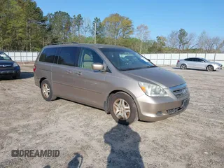 2007 Honda Odyssey EX-L z VIN 5FNRL38777B137904, wystawiony jako IAAI lot #41910031 z przebiegiem 132 745 mil mil oraz . Historia ofert i sprzedaży dostępna na DreamBid. Obrazek 1.