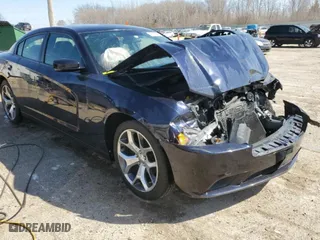 2012 Dodge Charger SE with VIN 2C3CDXBGXCH296816, listed as a Copart auction lot 49886985 with 140,529 mi miles and Salvage Title. Bid and sale history available at carsss.com. Image 4.