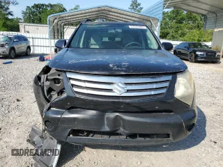2007 Suzuki XL7 z VIN 2S3DB217576119703, wystawiony jako Copart lot #57472495 z przebiegiem 186 872 mil mil oraz Szkoda całkowita • Salvage title. Historia ofert i sprzedaży dostępna na DreamBid. Obrazek 5.