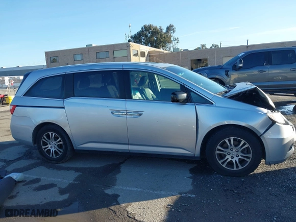 2011 Honda Odyssey EX-L with VIN 5FNRL5H6XBB057556, listed as a IAAI auction lot 41808620 with 154,449 mi miles. Bid and sale history available at carsss.com. Image 13.