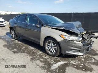 2015 Ford Fusion SE z VIN 3FA6P0HDXFR108055, wystawiony jako Copart lot #54801165 z przebiegiem 99 728 mil mil oraz Szkoda całkowita • Salvage title. Historia ofert i sprzedaży dostępna na DreamBid. Obrazek 4.