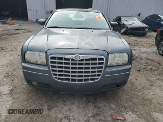 2005 Chrysler 300 with VIN 2C3JA53G65H651700, listed as a Copart auction lot 41861225 with 247,771 mi miles and Salvage Title. Bid and sale history available at carsss.com. Image 5.