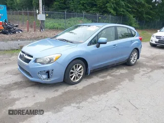 2012 Subaru Impreza Premium with VIN JF1GPAB64CH238673, listed as a IAAI auction lot 42548253 with 147,734 mi miles and . Bid and sale history available at DreamBid. Image 2.