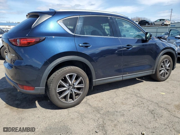 2017 Mazda CX-5 Grand Touring with VIN JM3KFBDL1H0207491, listed as a Copart auction lot 51382575 with 76,113 mi miles and Salvage Title. Bid and sale history available at carsss.com. Image 3.
