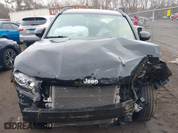 2015 Jeep Compass Latitude with VIN 1C4NJDEB3FD105704, listed as a IAAI auction lot 41719603 with 106,904 mi miles. Bid and sale history available at carsss.com. Image 12.
