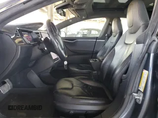 2014 Tesla Model S 60 with VIN 5YJSA1H17EFP63229, listed as a Copart auction lot 51776195 with 156,356 mi miles and Salvage Title. Bid and sale history available at DreamBid. Image 7.