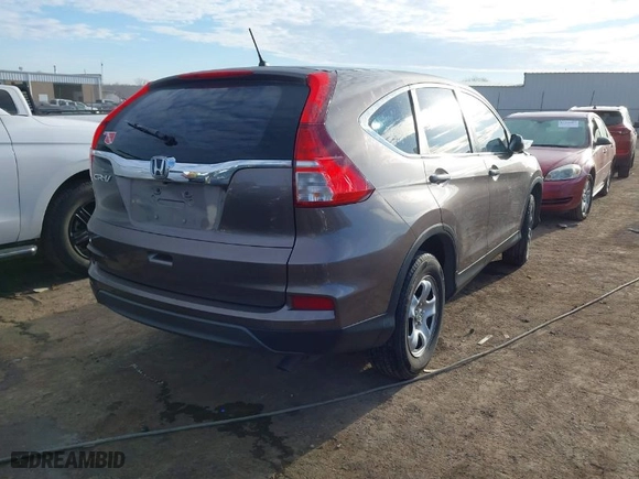 2015 Honda CR-V LX with VIN 3CZRM3H34FG707841, listed as a IAAI auction lot 41654996 with 133,894 mi miles. Bid and sale history available at carsss.com. Image 4.