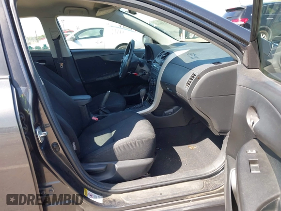 2009 Toyota Corolla with VIN 1NXBU40E69Z034459, listed as a IAAI auction lot 42095649 with 173,296 mi miles. Bid and sale history available at carsss.com. Image 5.