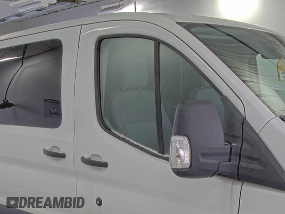 2018 Ford Transit z VIN 1FTYR1YG6JKA87506, wystawiony jako IAAI lot #42501070 z przebiegiem 167 892 mil mil oraz . Historia ofert i sprzedaży dostępna na DreamBid. Obrazek 4.