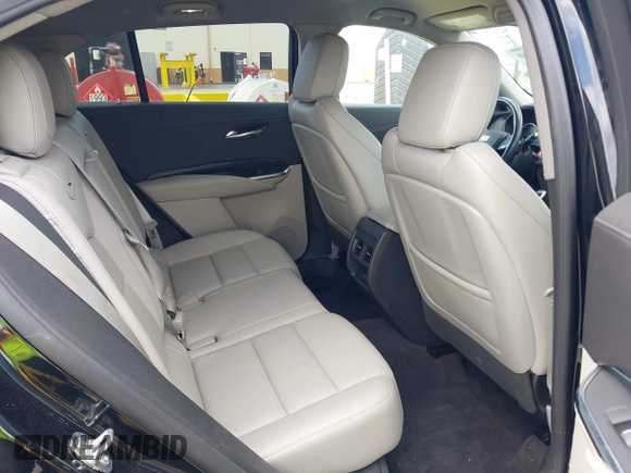 2023 Cadillac XT4 FWD Premium Luxury with VIN 1GYFZCR44PF170452, listed as a IAAI auction lot 42084960 with 22,212 mi miles and . Bid and sale history available at DreamBid. Image 8.