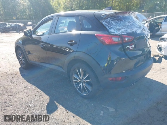 2018 Mazda CX-3 Touring z VIN JM1DKFC73J0321605, wystawiony jako IAAI lot #42355269 z przebiegiem 40 053 mil mil oraz . Historia ofert i sprzedaży dostępna na DreamBid. Obrazek 3.