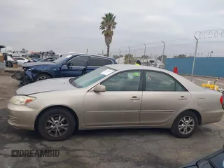 2004 Toyota Camry LE with VIN 4T1BF32K44U069081, listed as a IAAI auction lot 41460767 with 204,992 mi miles and . Bid and sale history available at carsss.com. Image 14.