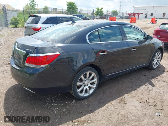 2013 Buick LaCrosse Touring z VIN 1G4GJ5E32DF324710, wystawiony jako IAAI lot #42561005 z przebiegiem 104 881 mil mil oraz . Historia ofert i sprzedaży dostępna na DreamBid. Obrazek 4.