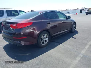 2014 Kia Optima LX with VIN 5XXGM4A77EG303496, listed as a IAAI auction lot 42572421 with 117,151 mi miles and . Bid and sale history available at DreamBid. Image 4.