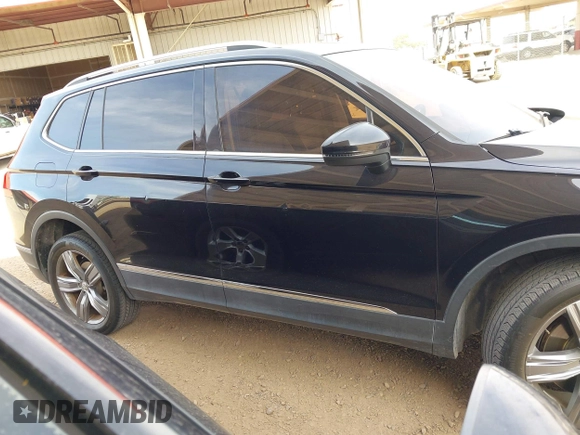 2020 Volkswagen Tiguan SE z VIN 3VV3B7AX7LM039084, wystawiony jako IAAI lot #42249016 z przebiegiem 126 763 mil mil oraz . Historia ofert i sprzedaży dostępna na DreamBid. Obrazek 13.