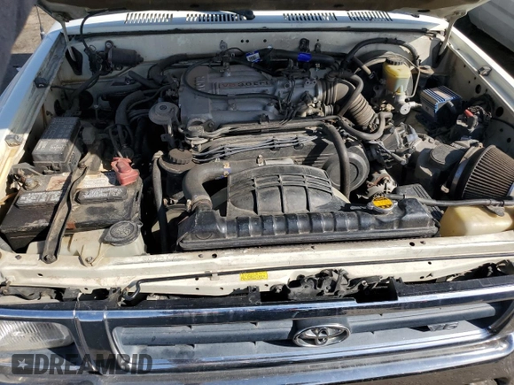 1993 Toyota Pickup DLX z VIN JT4VN13D3P5125406, wystawiony jako Copart lot #75011624 z przebiegiem 152 663 mil mil oraz Szkoda całkowita • Salvage title. Historia ofert i sprzedaży dostępna na DreamBid. Obrazek 11.