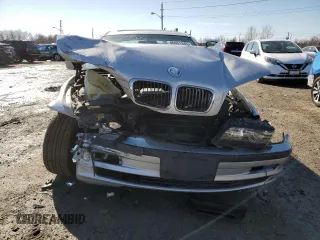 2000 BMW 3 Series 323i with VIN WBAAM3343YKC68050, listed as a Copart auction lot 46051345 with 137,890 mi miles and Salvage title. Bid and sale history available at DreamBid. Image 5.