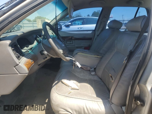 1999 Mercury Grand Marquis LS z VIN 2MEFM75W5XX673218, wystawiony jako Copart lot #52621285 z przebiegiem 163 642 mil mil oraz Szkoda całkowita • Salvage title. Historia ofert i sprzedaży dostępna na DreamBid. Obrazek 7.