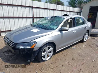 2013 Volkswagen Passat SE w/Sunroof with VIN 1VWBH7A39DC071878, listed as a IAAI auction lot 41903291 with 107,096 mi miles. Bid and sale history available at carsss.com. Image 2.