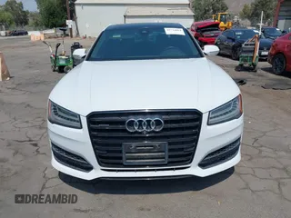 2017 Audi A8 Sport with VIN WAU43AFD3HN010445, listed as a IAAI auction lot 42714864 with 106,748 mi miles and . Bid and sale history available at DreamBid. Image 13.