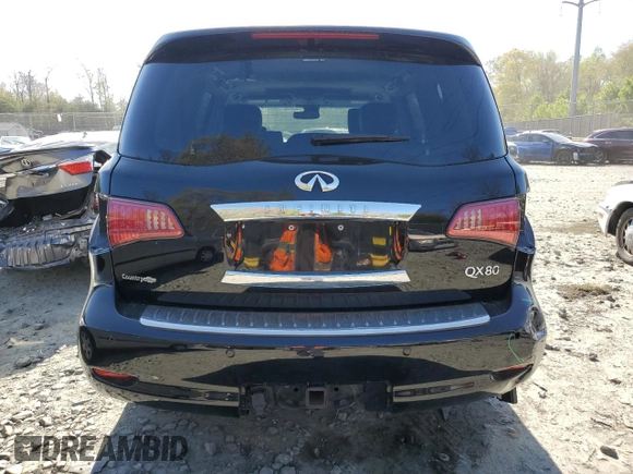 2014 Infiniti QX80 with VIN JN8AZ2NC8E9351805, listed as a Copart auction lot 51715735 with 130,943 mi miles and Salvage Title. Bid and sale history available at carsss.com. Image 6.