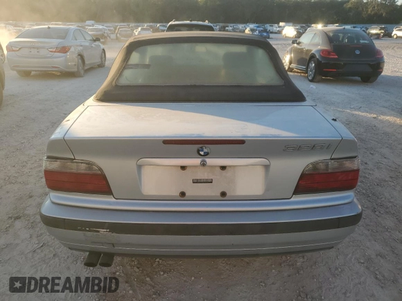 1998 BMW 3 Series z VIN WBABK8330WEY89818, wystawiony jako Copart lot #41557015 z przebiegiem 253 522 mil mil oraz Nie do naprawy • Non repairable. Historia ofert i sprzedaży dostępna na DreamBid. Obrazek 6.