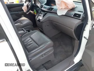 2011 Honda Odyssey EX-L with VIN 5FNRL5H67BB070541, listed as a IAAI auction lot 41812554 with 150,898 mi miles and . Bid and sale history available at DreamBid. Image 5.
