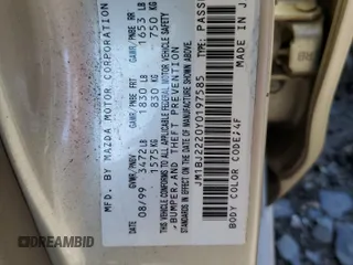 2000 Mazda Protege DX z VIN JM1BJ2220Y0197585, wystawiony jako Copart lot #65309404 z przebiegiem Nie podano mil oraz Nie do naprawy • Non repairable. Historia ofert i sprzedaży dostępna na DreamBid. Obrazek 12.