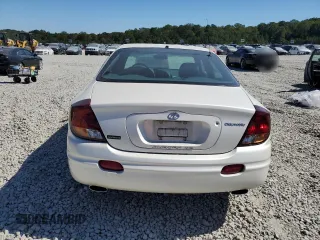 2003 Oldsmobile Aurora z VIN 1G3GS64CX34163493, wystawiony jako Copart lot #75863314 z przebiegiem 211 607 mil mil oraz Szkody całkowita. Historia ofert i sprzedaży dostępna na DreamBid. Obrazek 6.