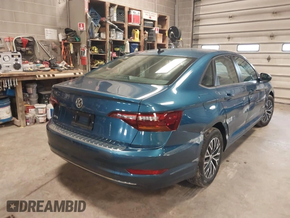 2019 Volkswagen Jetta SEL z VIN 3VWE57BU2KM116717, wystawiony jako IAAI lot #41951428 z przebiegiem 85 791 mil mil oraz . Historia ofert i sprzedaży dostępna na DreamBid. Obrazek 4.