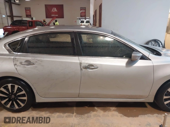 2018 Nissan Altima SR with VIN 1N4AL3AP4JC282996, listed as a IAAI auction lot 41722960 with 139,532 mi miles and . Bid and sale history available at carsss.com. Image 12.