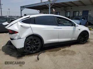 2017 Tesla Model X 90D with VIN 5YJXCAE26HF079421, listed as a Copart auction lot 47889005 with 88,281 mi miles and Salvage Title. Bid and sale history available at DreamBid. Image 3.