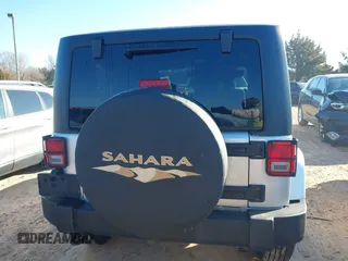 2011 Jeep Wrangler Sahara with VIN 1J4AA5D18BL639594, listed as a IAAI auction lot 41612096 with 138,624 mi miles and . Bid and sale history available at DreamBid. Image 16.
