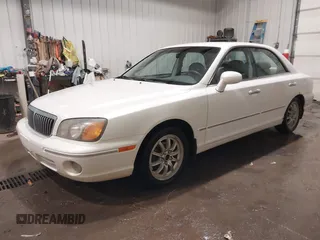 2002 Hyundai XG L z VIN KMHFU45EX2A180204, wystawiony jako IAAI lot #41472564 z przebiegiem 148 333 mil mil oraz . Historia ofert i sprzedaży dostępna na DreamBid. Obrazek 2.