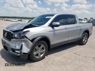 2021 Honda Ridgeline RTL-E with VIN 5FPYK3F73MB008806, listed as a Copart auction lot 62234825 with 84,716 mi miles and Salvage title. Bid and sale history available at DreamBid. Image 1.