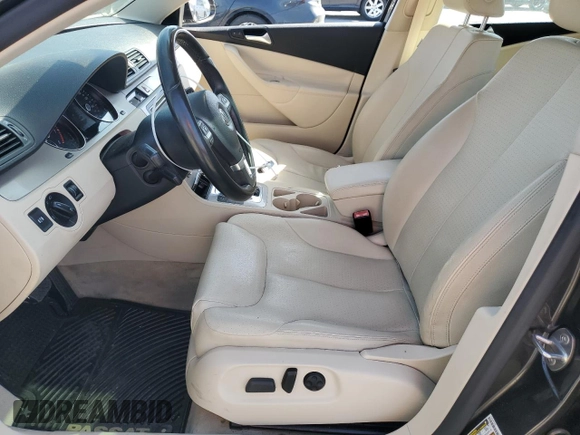 2010 Volkswagen Passat Komfort with VIN WVWJK7ANXAE129739, listed as a Copart auction lot 57798275 with 155,830 mi miles and Salvage title. Bid and sale history available at DreamBid. Image 7.