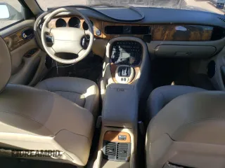 2001 Jaguar XJ with VIN SAJDA23C31LF28667, listed as a Copart auction lot 76983144 with 87,542 mi miles and Clean title. Bid and sale history available at DreamBid. Image 8.