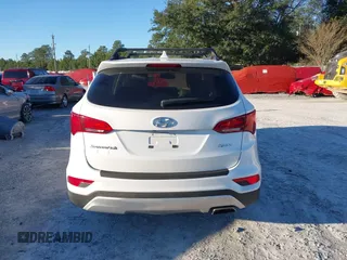 2017 Hyundai Santa Fe 2.4L z VIN 5XYZU3LB4HG435992, wystawiony jako IAAI lot #40927607 z przebiegiem 104 868 mil mil oraz . Historia ofert i sprzedaży dostępna na DreamBid. Obrazek 17.