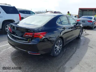 2016 Acura TLX Tech with VIN 19UUB1F5XGA015812, listed as a IAAI auction lot 41871181 with 135,638 mi miles. Bid and sale history available at carsss.com. Image 4.