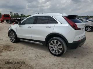 2021 Cadillac XT4 FWD Premium Luxury with VIN 1GYFZCR44MF080763, listed as a Copart auction lot 54059525 with 46,319 mi miles and Salvage Title. Bid and sale history available at carsss.com. Image 2.