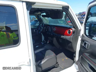 2021 Jeep Wrangler Unlimited Rubicon with VIN 1C4HJXFN9MW519496, listed as a IAAI auction lot 41676845 with 72,767 mi miles. Bid and sale history available at carsss.com. Image 5.