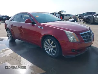 2009 Cadillac CTS RWD z VIN 1G6DV57V390173111, wystawiony jako IAAI lot #42269117 z przebiegiem 165 666 mil mil oraz . Historia ofert i sprzedaży dostępna na DreamBid. Obrazek 1.