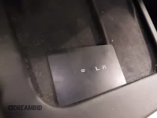 2022 Tesla Model 3 with VIN 5YJ3E1EA4NF187113, listed as a IAAI auction lot 41712331 with 81,879 mi miles and . Bid and sale history available at DreamBid. Image 11.