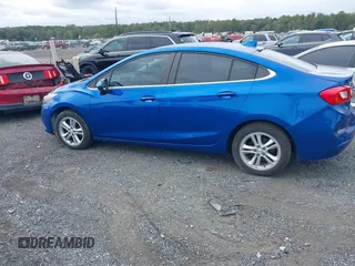 2016 Chevrolet Cruze LT z VIN 1G1BE5SM5G7321470, wystawiony jako IAAI lot #40456371 z przebiegiem 90 350 mil mil oraz . Historia ofert i sprzedaży dostępna na DreamBid. Obrazek 14.