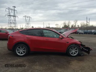2022 Tesla Model Y Long Range with VIN 7SAYGDEE1NF442159, listed as a IAAI auction lot 41674506 with 82,355 mi miles and . Bid and sale history available at DreamBid. Image 13.