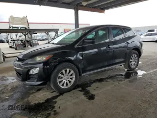 2012 Mazda CX-7 i Touring z VIN JM3ER2CM1C0421615, wystawiony jako Copart lot #50592295 z przebiegiem 83 955 mil mil oraz Szkoda całkowita • Salvage title. Historia ofert i sprzedaży dostępna na DreamBid. Obrazek 1.